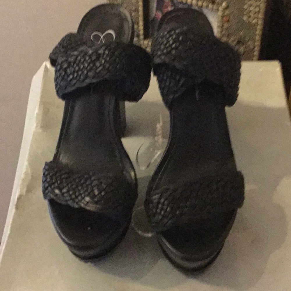 Black leather platform sandals size 8.